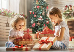 girls opening gifts