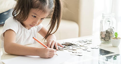 girl with piggy bank