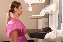 woman getting mammogram