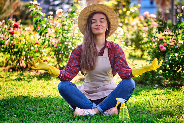 Woman meditating in the garden